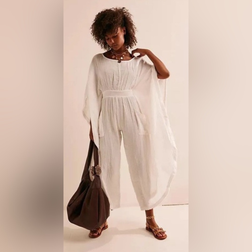 NWOT Free People One Piece Oversized Jumpsuit with front pockets Sz Sm No flaws